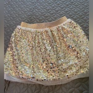 Girls gold glitter skirt
Size 5